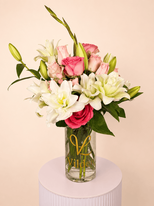 Sweet Lily bouquet: Graceful lilies, soft pink roses fresh, sweet, and quietly romantic. Handcrafted by Vilden's designers.