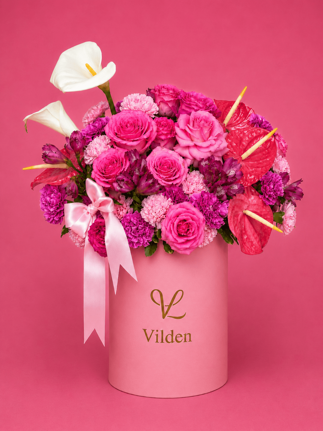 Pink Rhapsody floral arrangement with vivid pink blooms in a luxury flower box