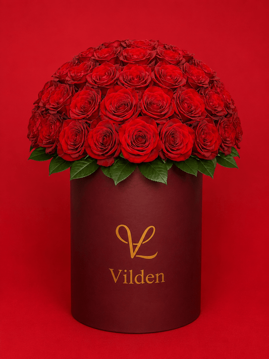 Indulge in a complete world of deep claret-red roses with Rose Sphere. Handcrafted luxury for the ultimate romantic gesture.