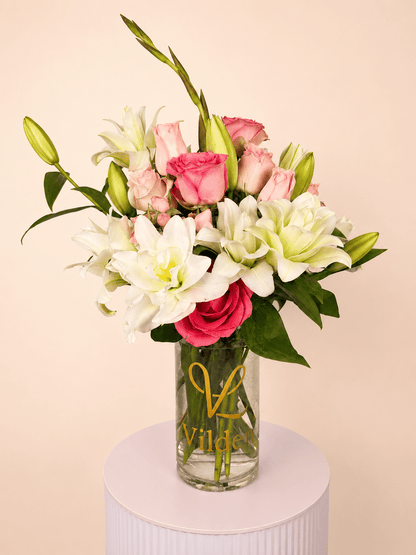Sweet Lily bouquet: Graceful lilies, soft pink roses fresh, sweet, and quietly romantic. Handcrafted by Vilden's designers.