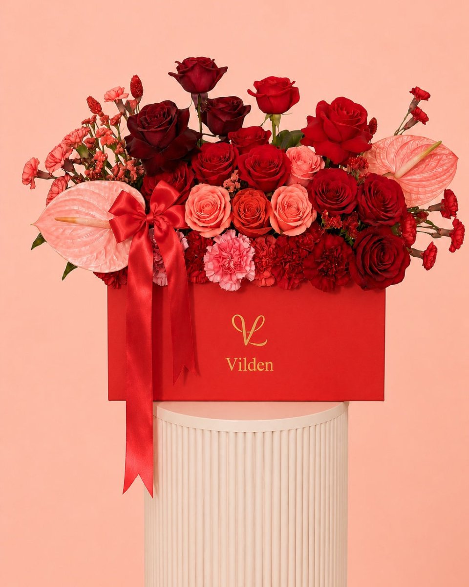 Crimson Serenade red rose flower box with pink anthurium, and Vilden luxury floral design.