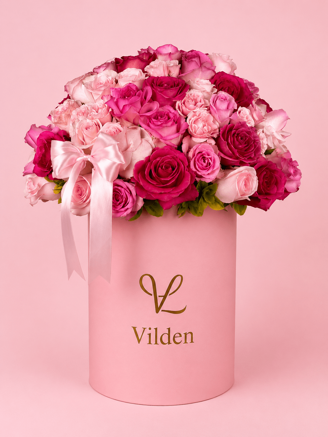 Blush Crescendo is a flower arrangement with fresh pink blooms in an elegant floral design