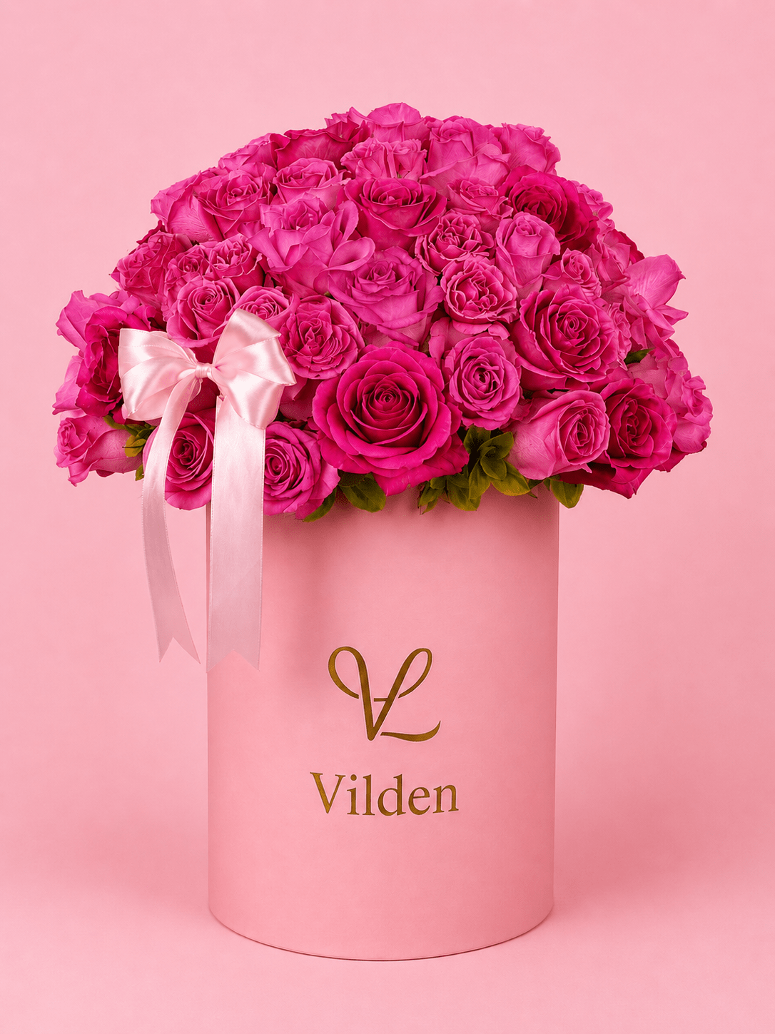 Blush Crescendo is a flower arrangement with fresh pink blooms in an elegant floral design