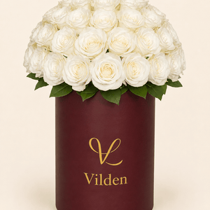 Pearl Sphere: A timeless world of pure white roses, elegance at its peak. Handcrafted by Vilden's designers for perfection.